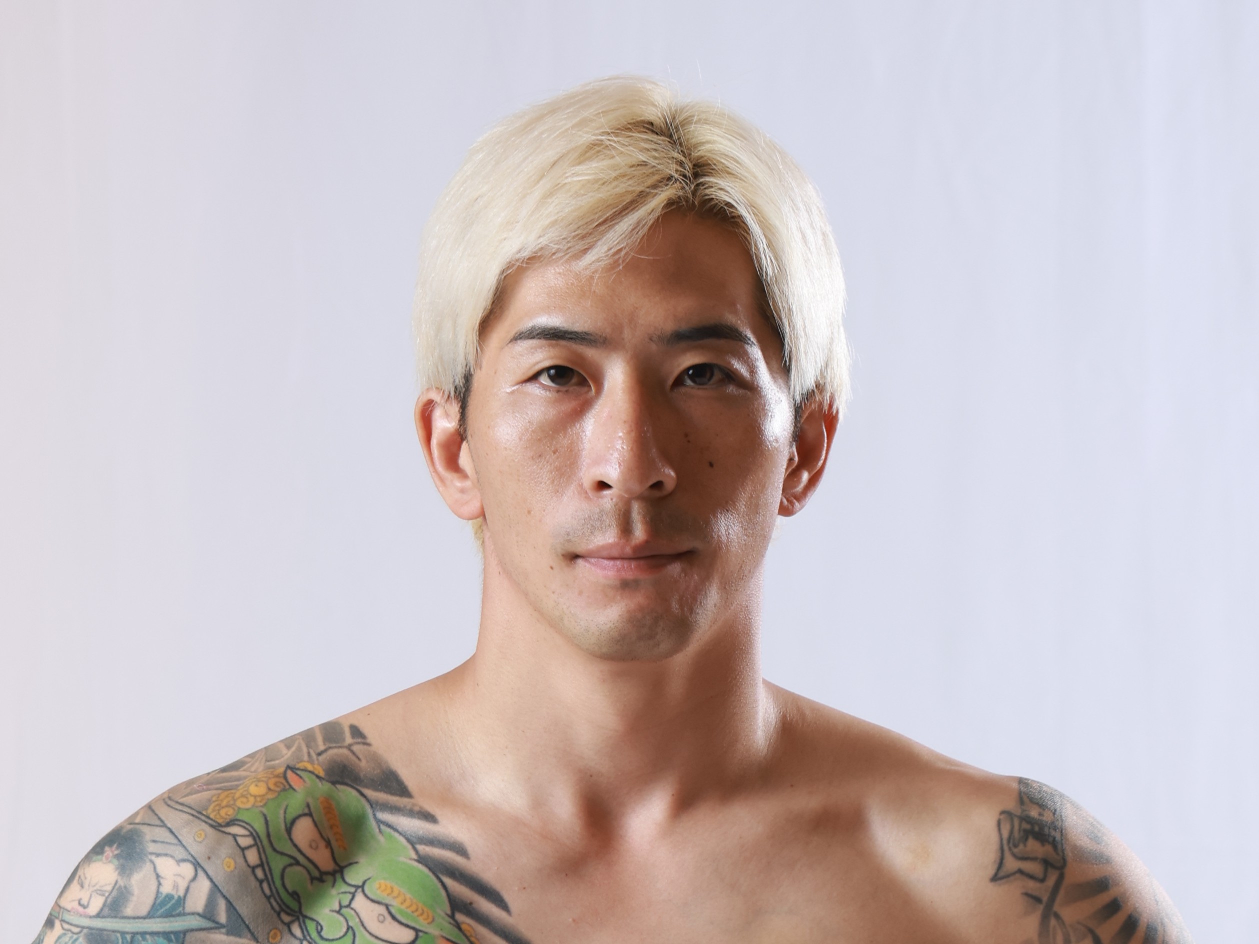 藁谷 兼介